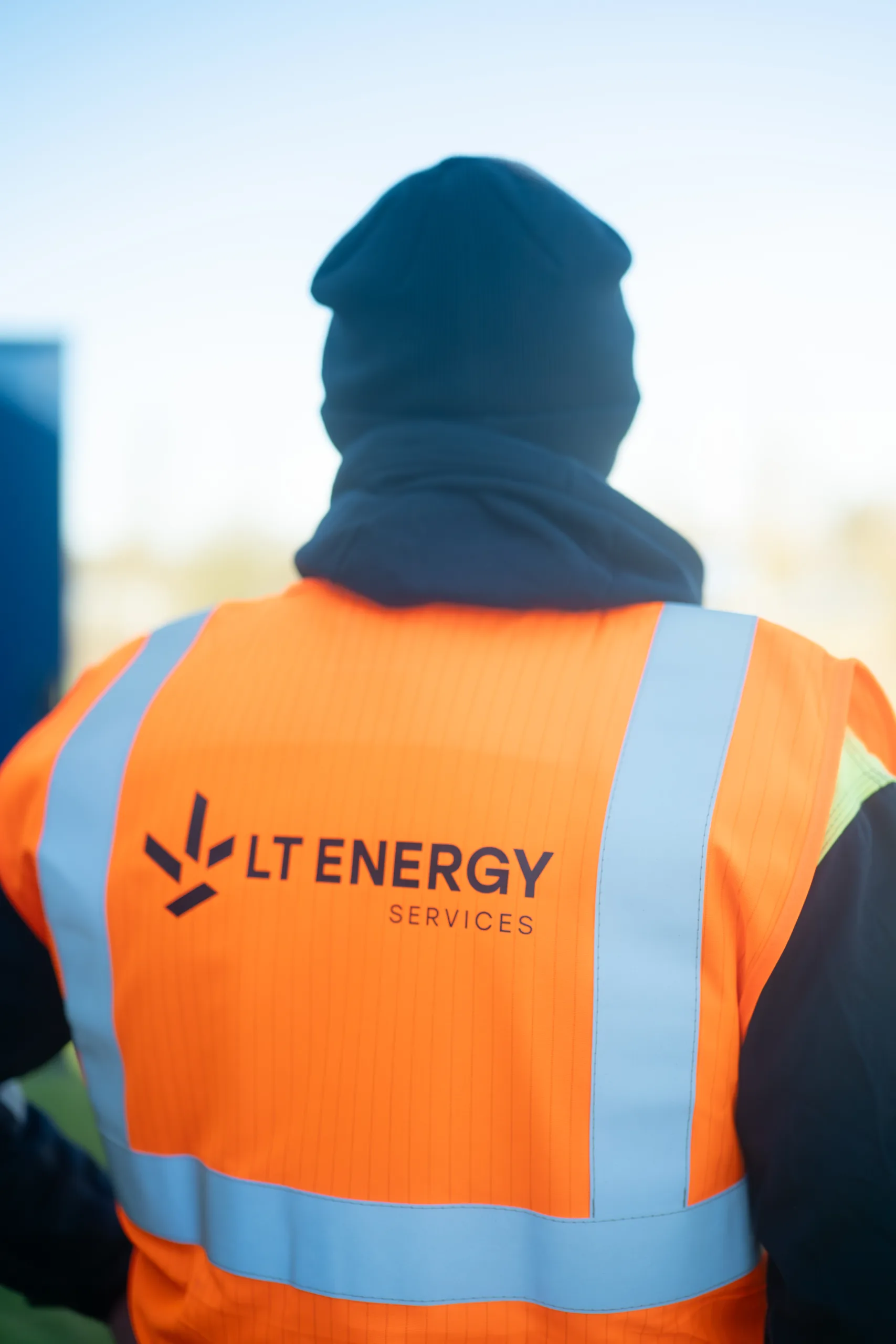 Rear shot of team member in LT Energy Hi Vis