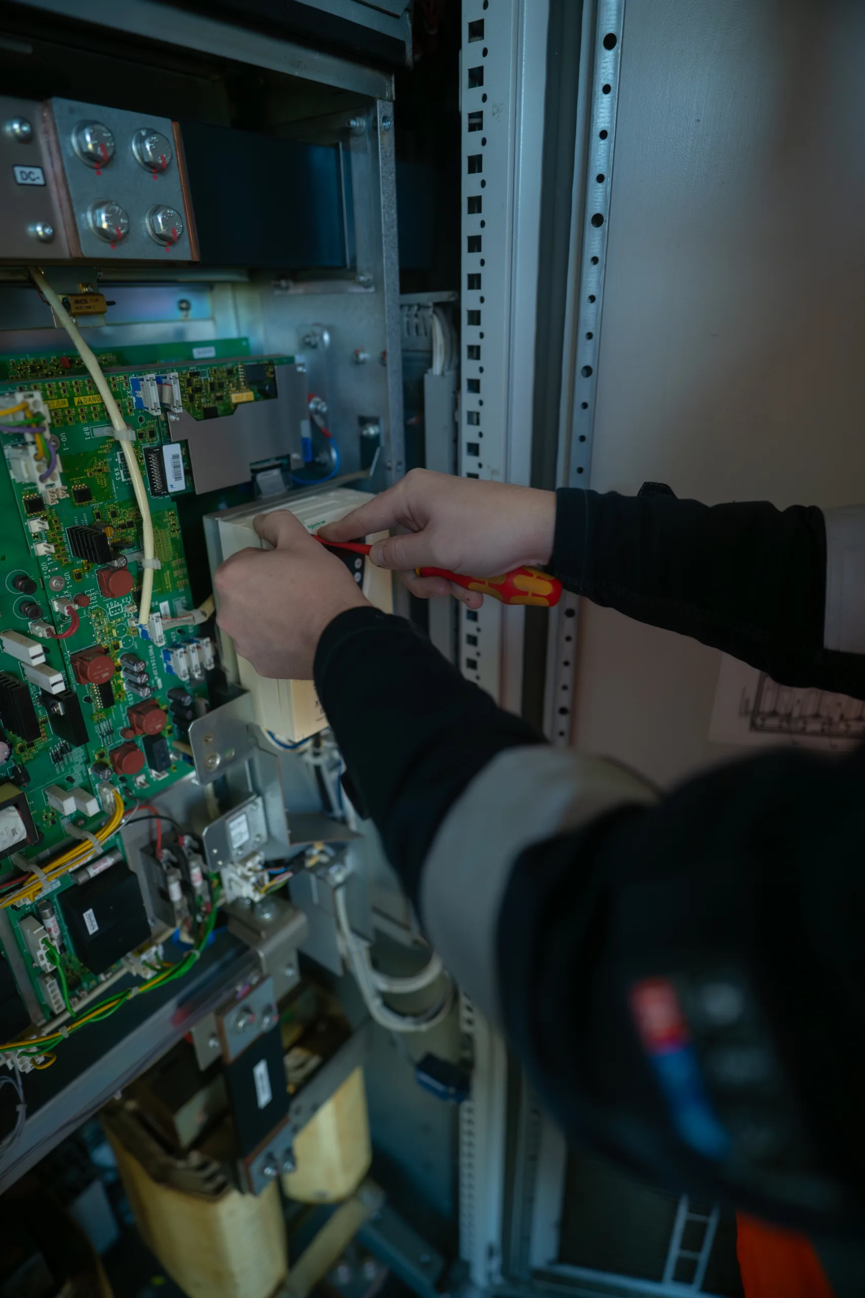 Close up of engineer working on inverter