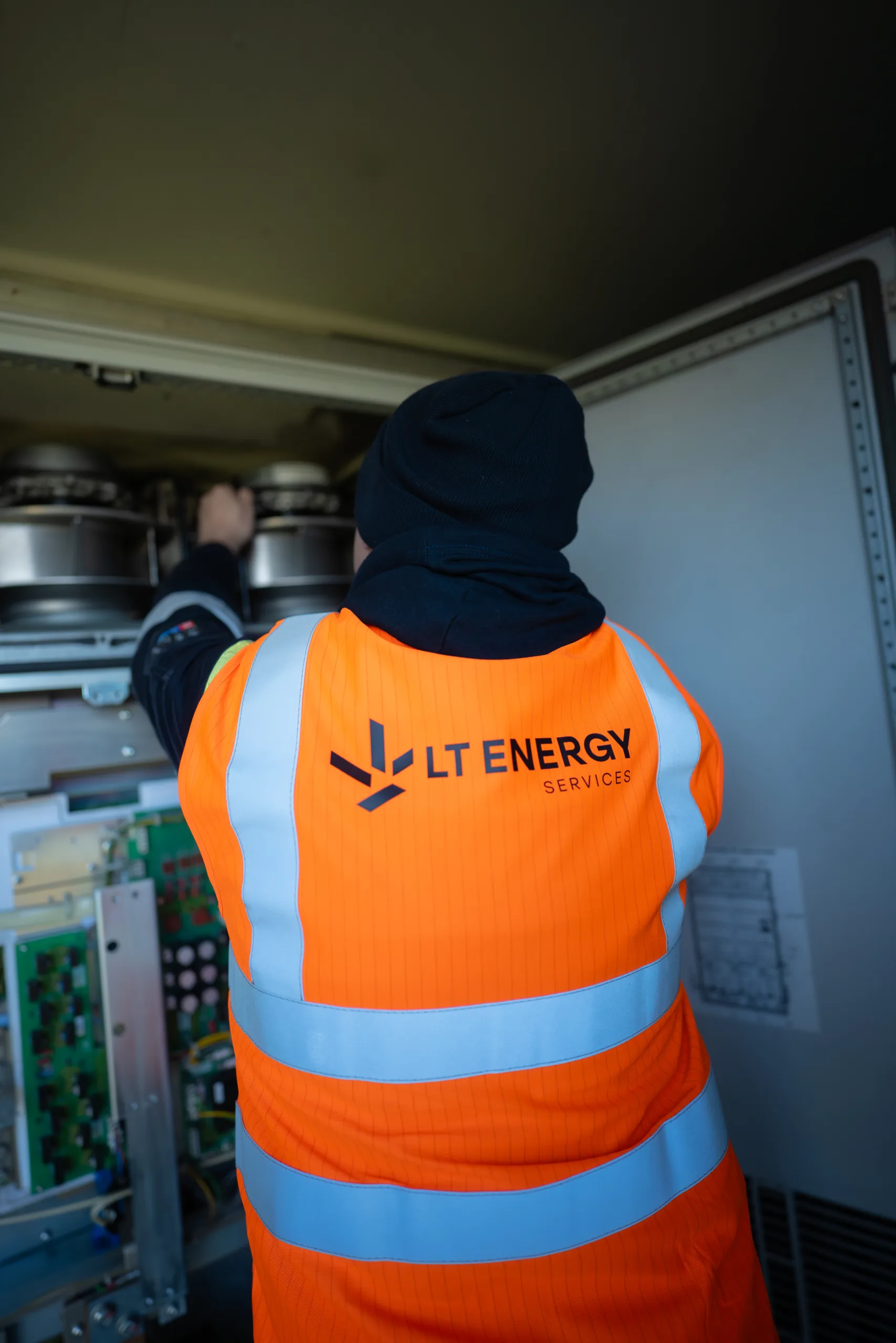 Team at work maintaining an inverter